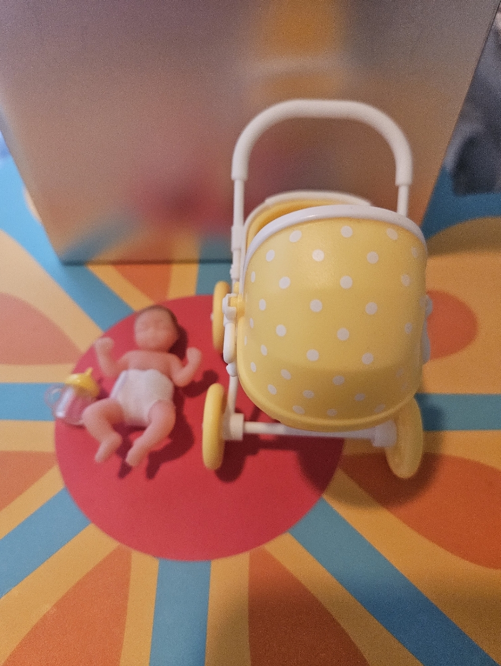 Zuru Mini Baby Doll in Yellow Polka-Dot Stroller - Picture 4 of 7